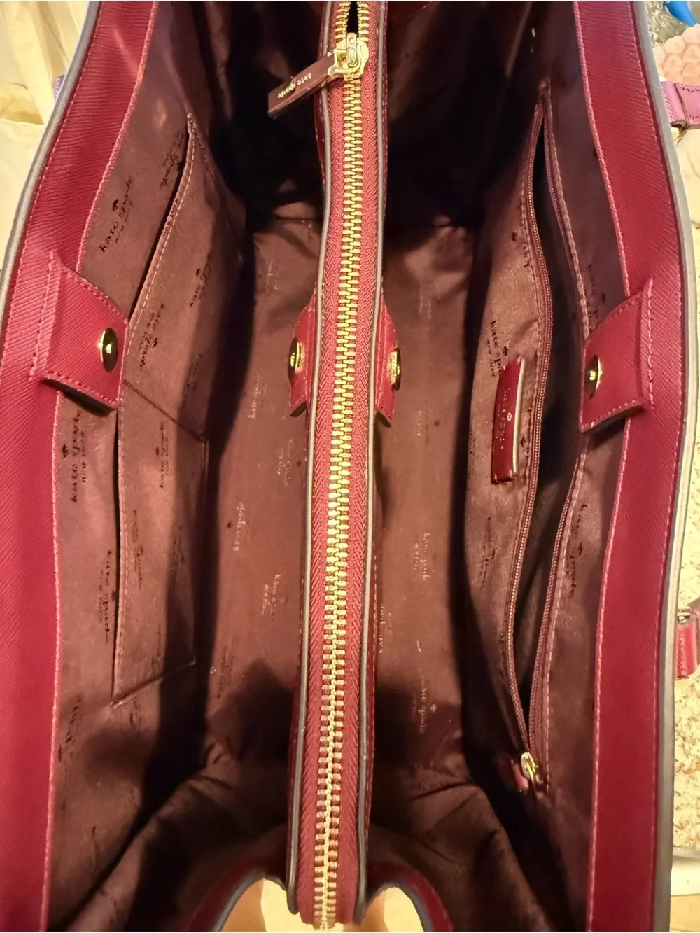 Kate Spade Madison Saffiano East-West Leather Laptop Tote in Burgundy